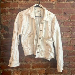 White floral Zara size M denim jacket.